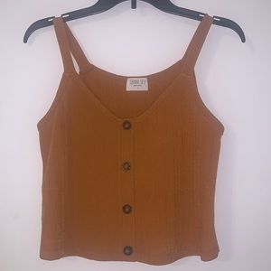 S tan/bronzy colored loose tank top!